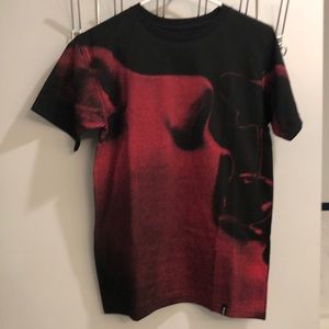 Huf black and red short sleeve tee.